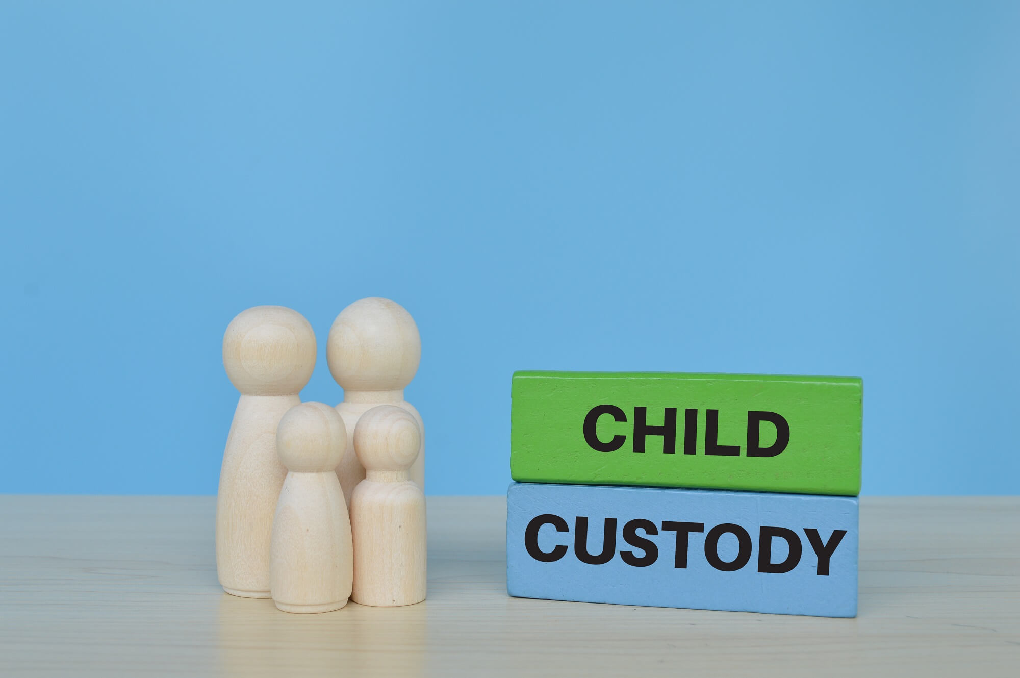 Figures of parents and children next to the child custody designation.